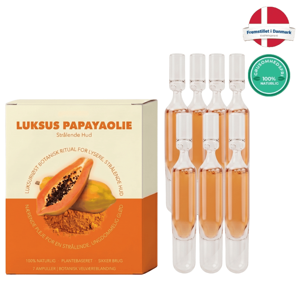 Luksus Papayaolie produktbillede med ampuller, der understøtter strålende hud og fugtgivende pleje.